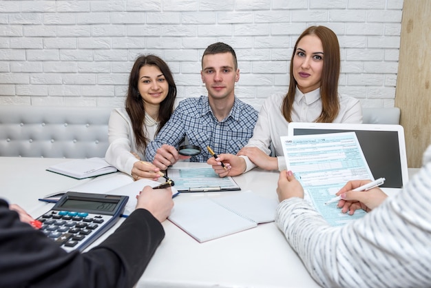 beautiful financial consultants with 1040 tax form office 359031 13825